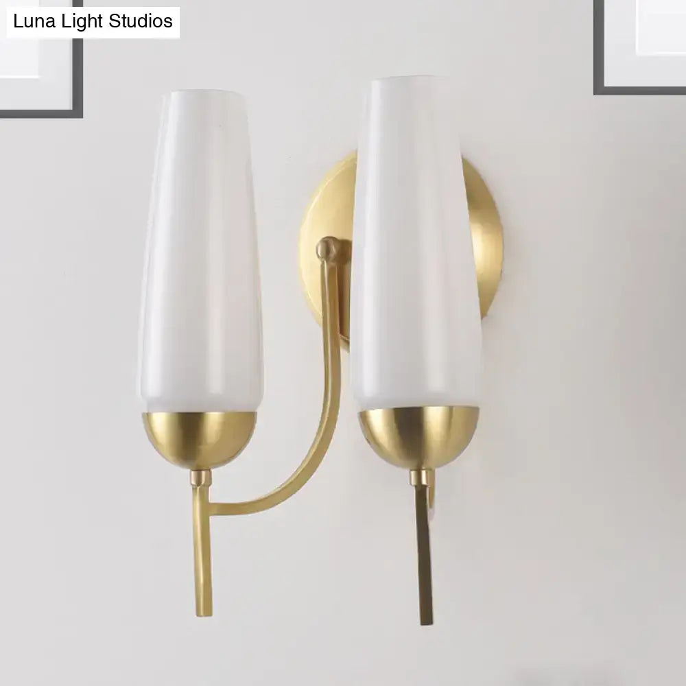 Contemporary gold and opal conical wall sconce bedroom light