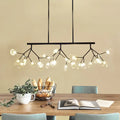Contemporary gold & black branching island chandelier dining room