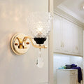 Contemporary gold crystal drop wall sconce – bedroom teardrop crystal