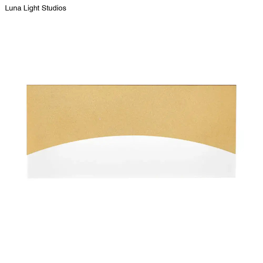 Contemporary white & gold bedroom sconce with warm color temperature