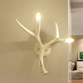 Contemporary white resin antler wall sconce for restaurant dining room