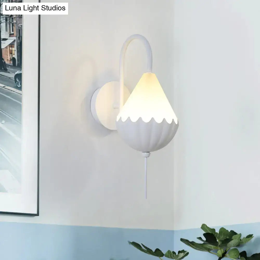 Contemporary white scalloped wall light fixture with curved arm bedroom