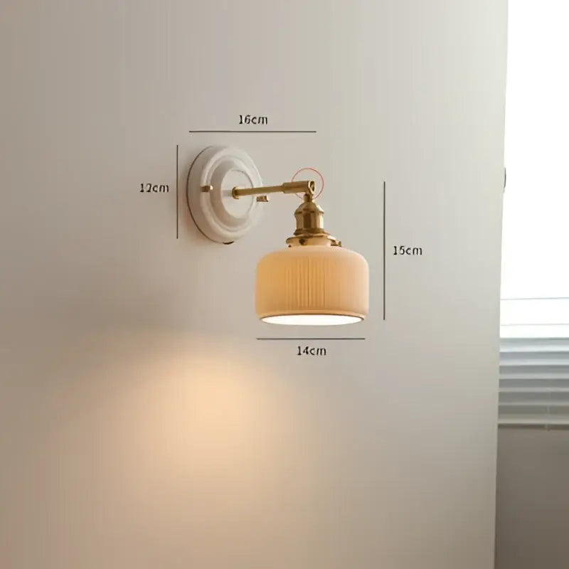 Cream ceramic led wall light with copper arm bedroom sconce