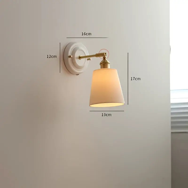 Cream ceramic led wall light with copper arm bedroom sconce