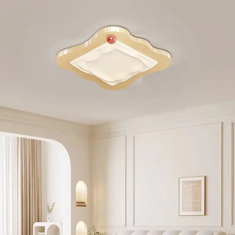 Cream cloud led ceiling light with red accent bedroom decor