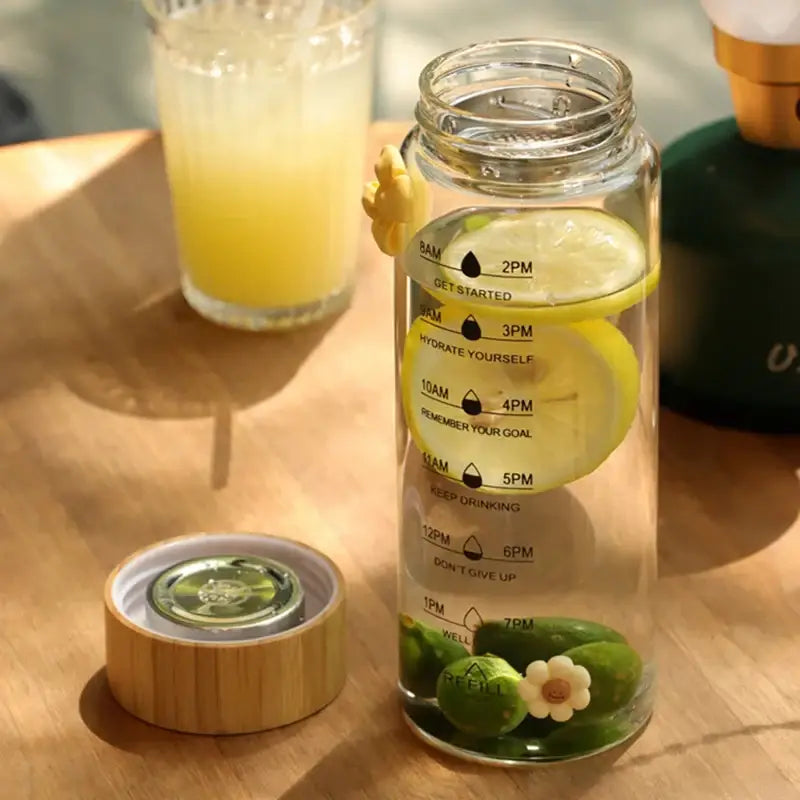 Modern glass water bottle with wood lid and tea filter kitchen accessory