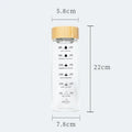 Modern glass water bottle with wood lid and tea filter kitchen accessory