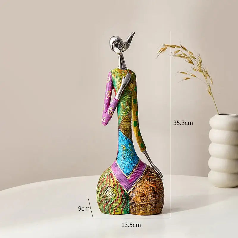 Decorbites abstract woman sculpture vibrant patterned living room decor