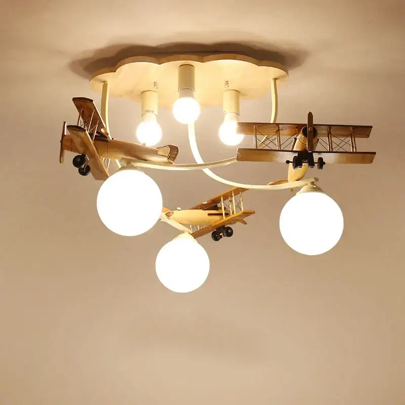 Wooden airplane chandelier light with cloud base for nursery room
