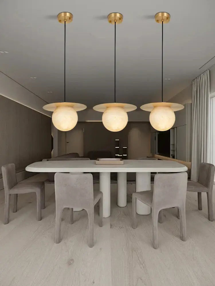 Modern gold and white marble pendant lights for dining room