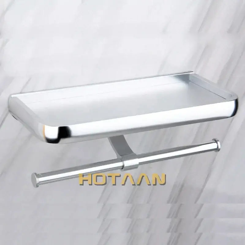 Modern chrome toilet paper holder with bathroom shelf