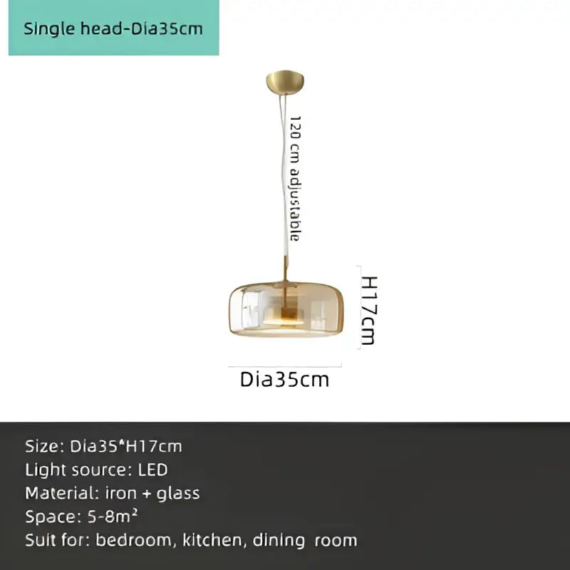 Modern amber glass chandelier with brass accents for living room