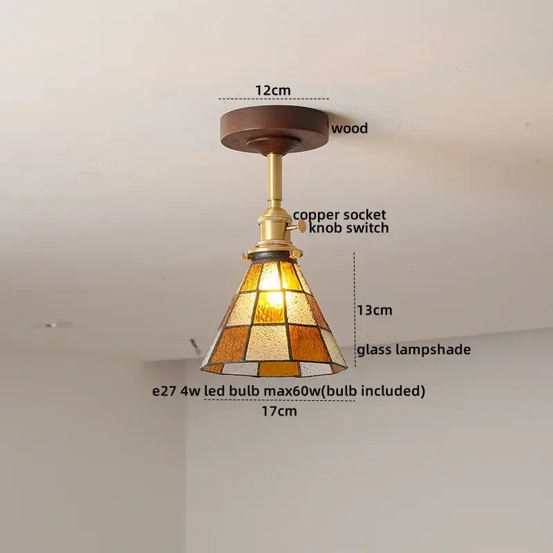 Modern amber glass and copper ceiling light fixture dining room