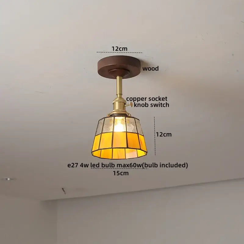 Modern amber glass and copper ceiling light fixture dining room