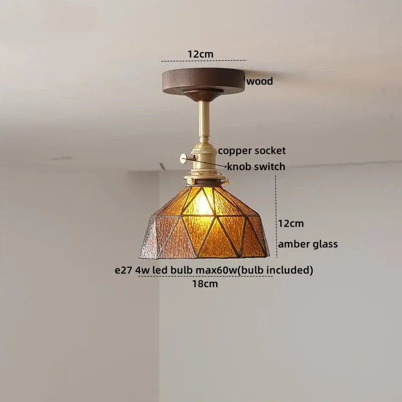 Modern amber glass and copper ceiling light fixture dining room