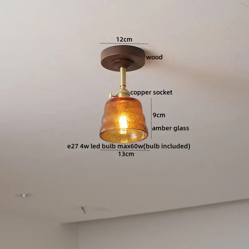 Modern amber glass and copper ceiling light fixture dining room