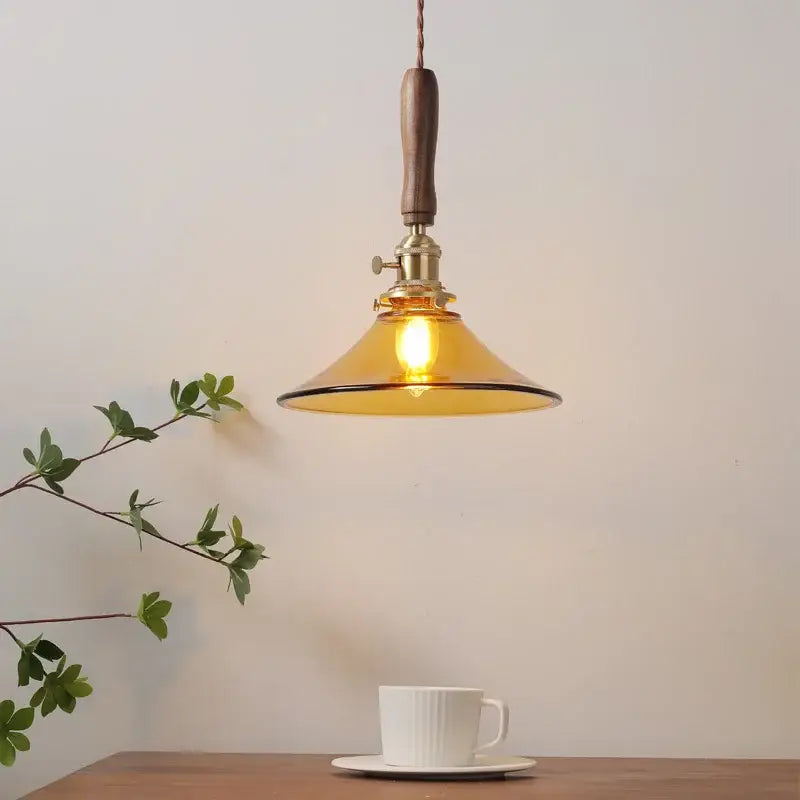 Decorbites amber glass led pendant light with walnut dining room