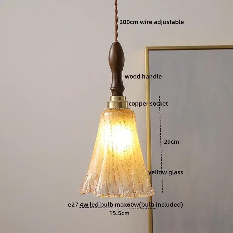 Modern amber glass pendant light with wood handle dining room