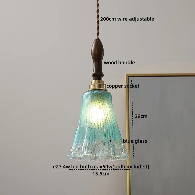 Modern amber glass pendant light with wood handle dining room