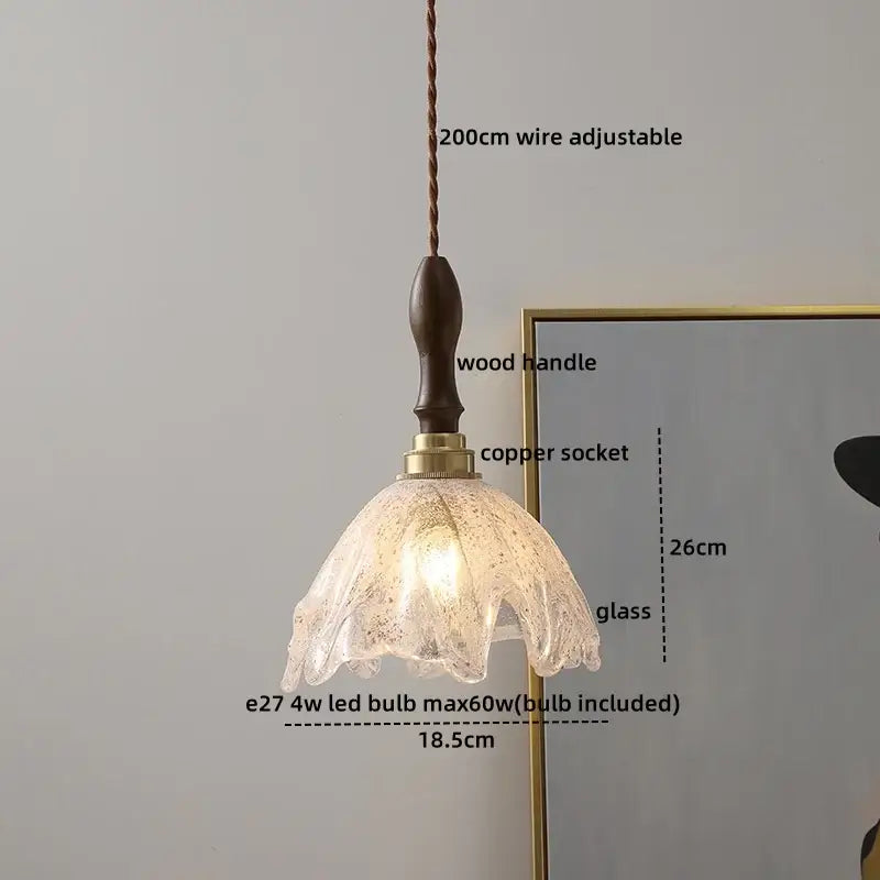 Modern amber glass pendant light with wood handle dining room