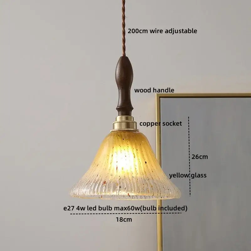 Modern amber glass pendant light with wood handle dining room