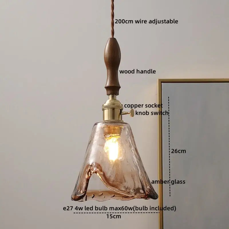 Modern amber glass pendant light with wood handle dining room
