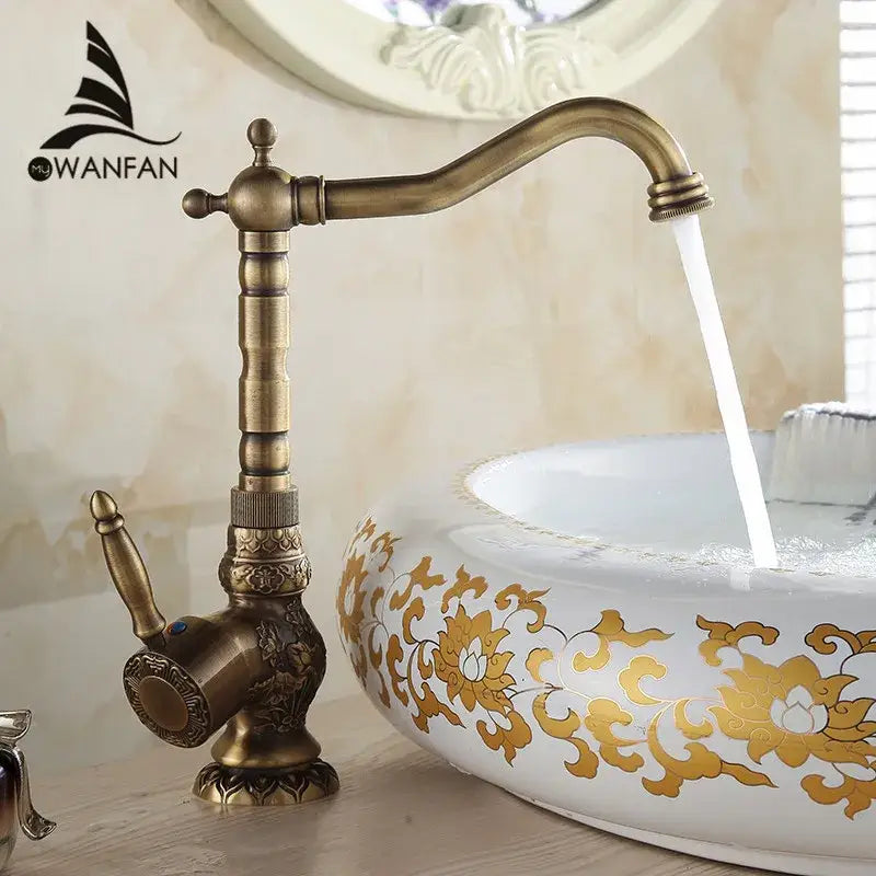 Antique brass basin faucet with engraved floral detail kitchen tap