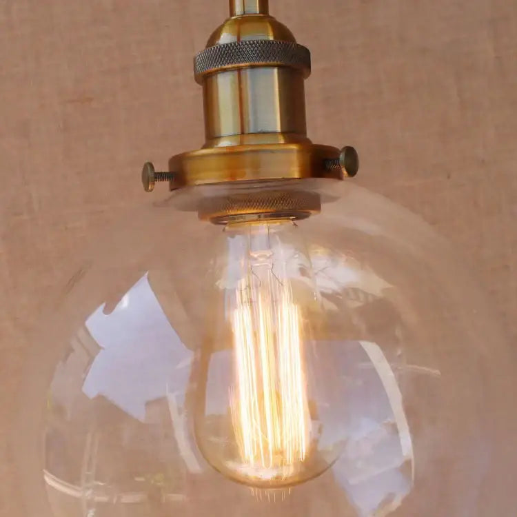 Antique brass swing arm wall lamp bedroom glass globe sconce