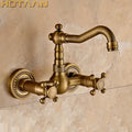 Antique brass wall mounted kitchen faucet with twisted rope detail