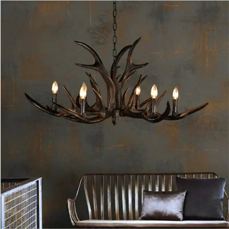 Rustic dark metallic antler chandelier with black shades dining room