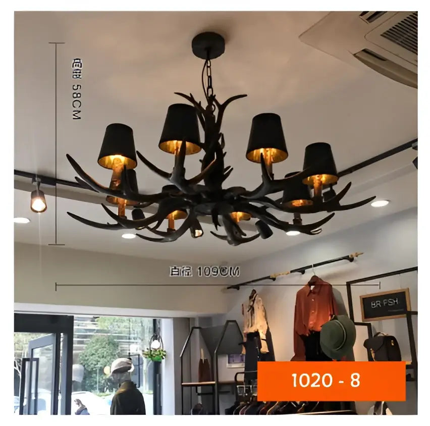Rustic dark metallic antler chandelier with black shades dining room