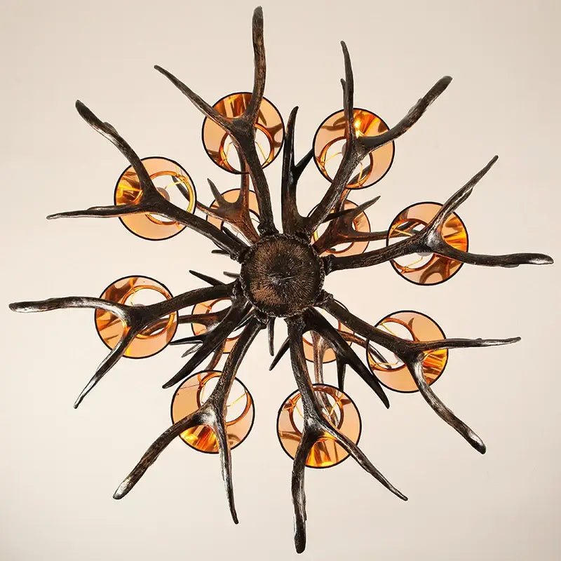 Rustic dark metallic antler chandelier with black shades dining room