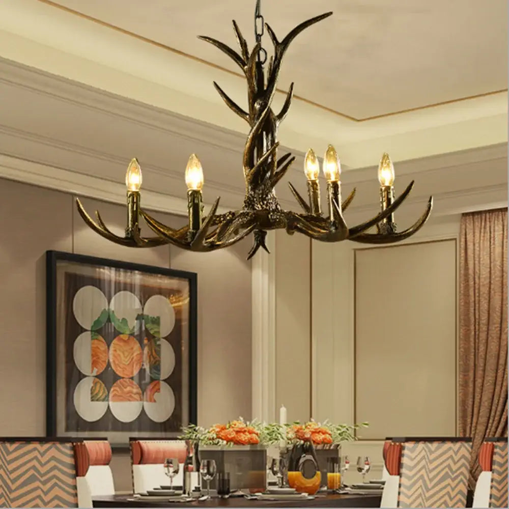 Rustic dark metallic antler chandelier with black shades dining room