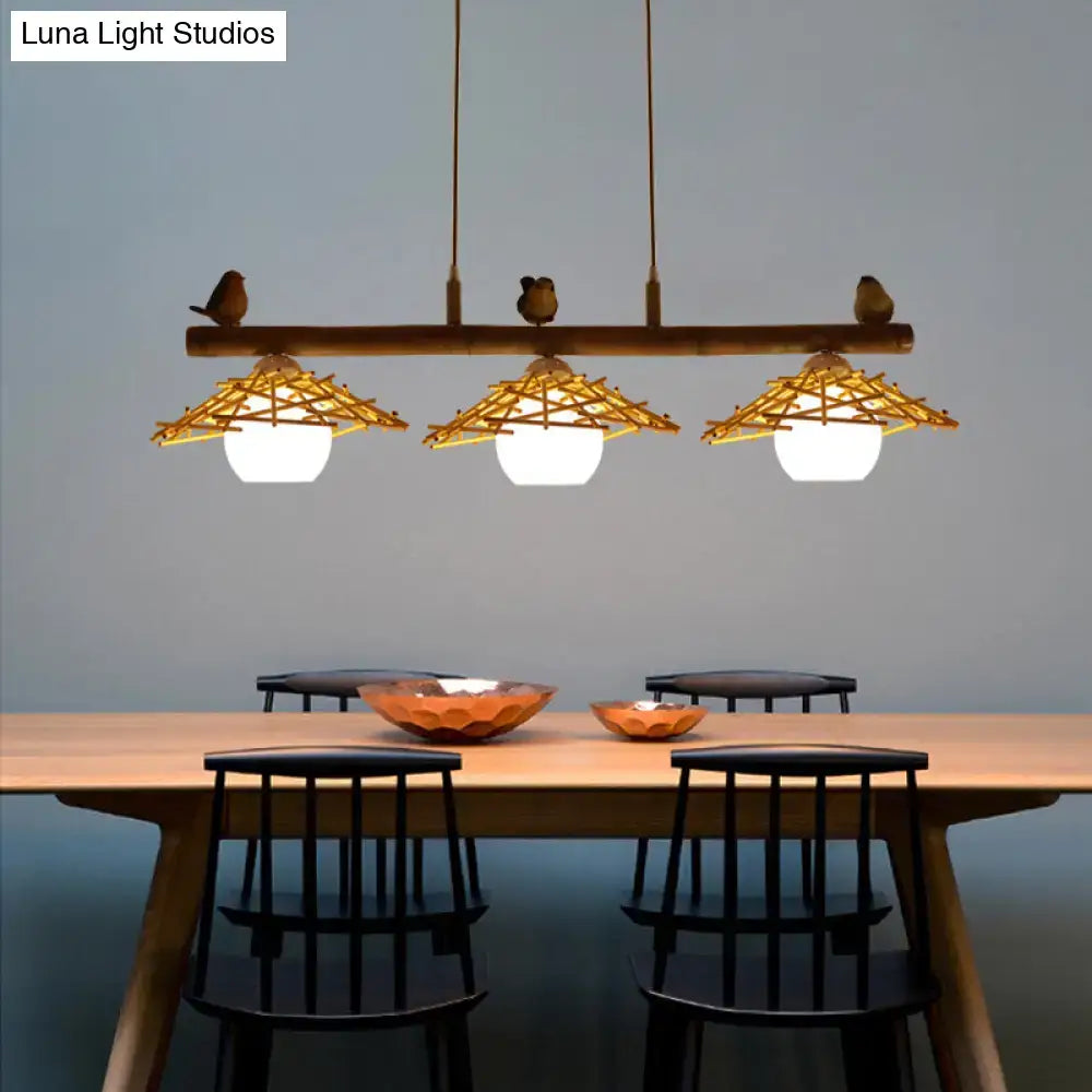 Rustic bamboo pendant with birds and white glass globe dining room