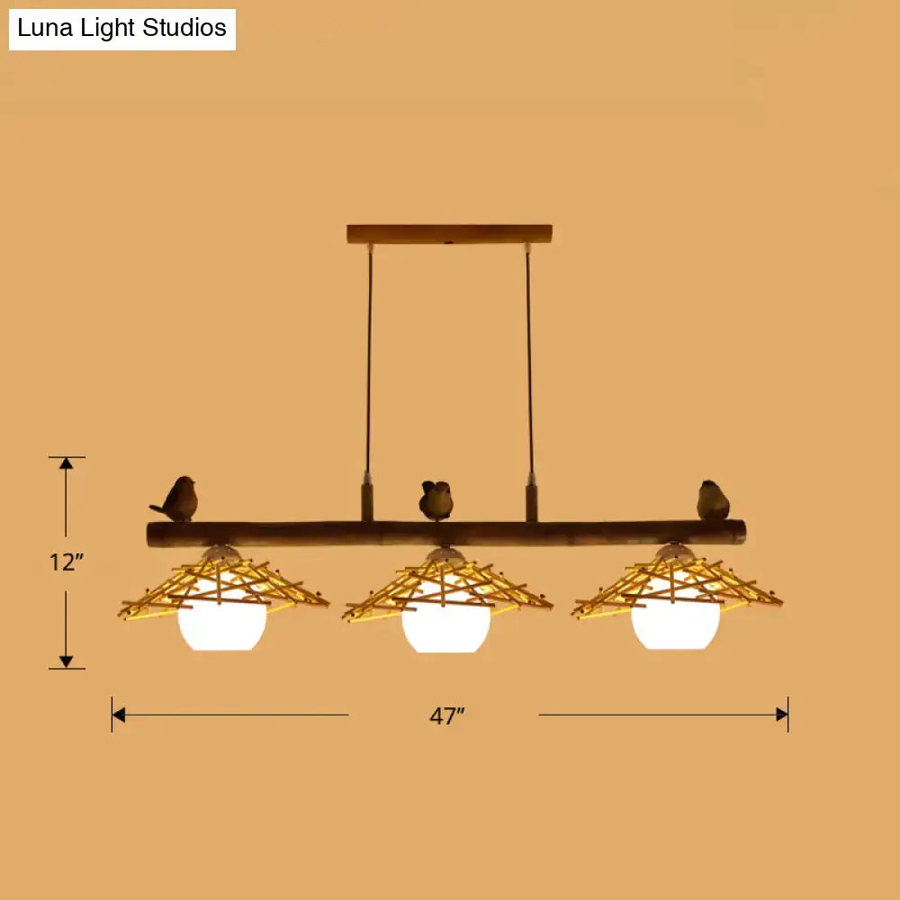 Rustic bamboo pendant with birds and white glass globe dining room