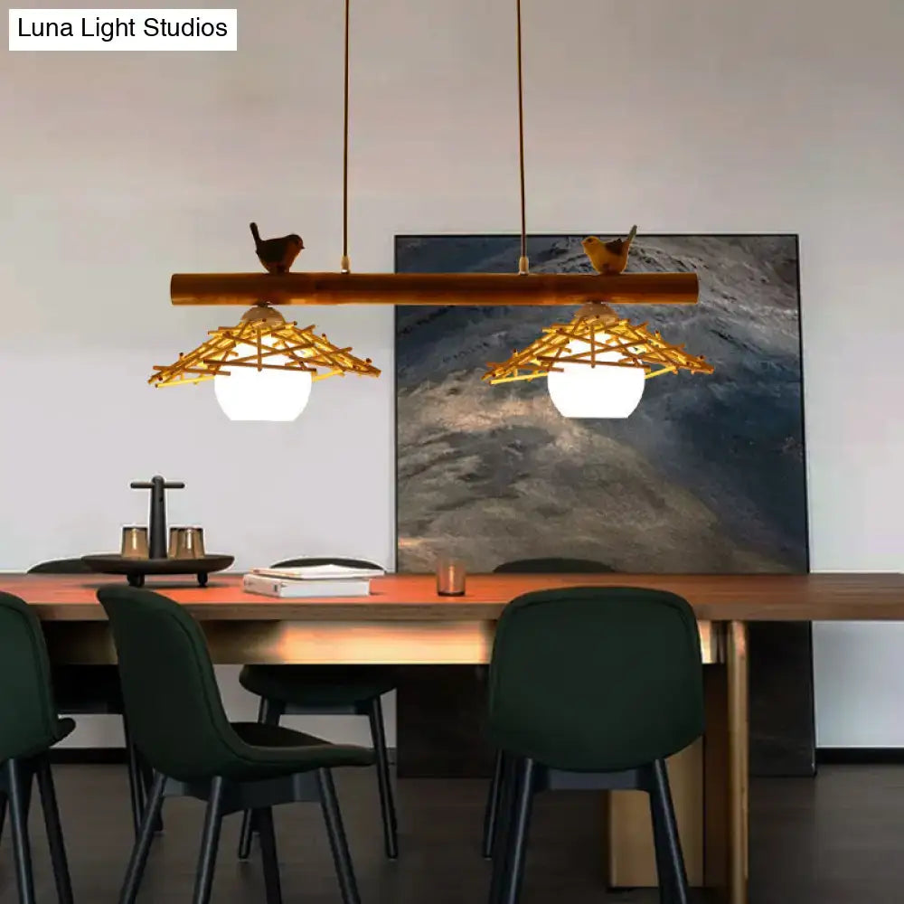 Rustic bamboo pendant with birds and white glass globe dining room