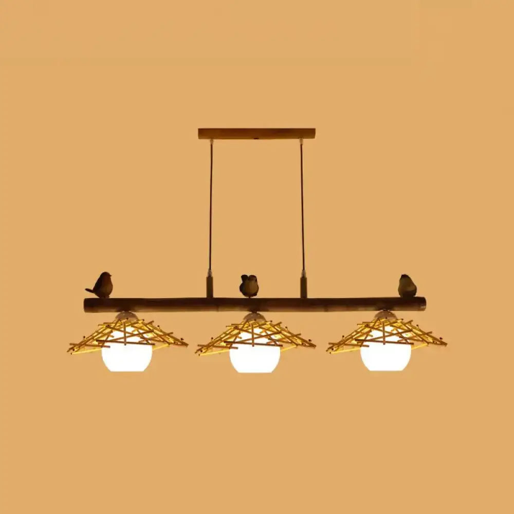 Rustic bamboo pendant with birds and white glass globe dining room