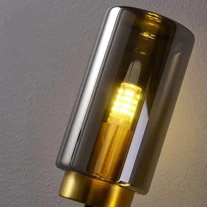 Modern brass and black glass wall lamp living room sconce