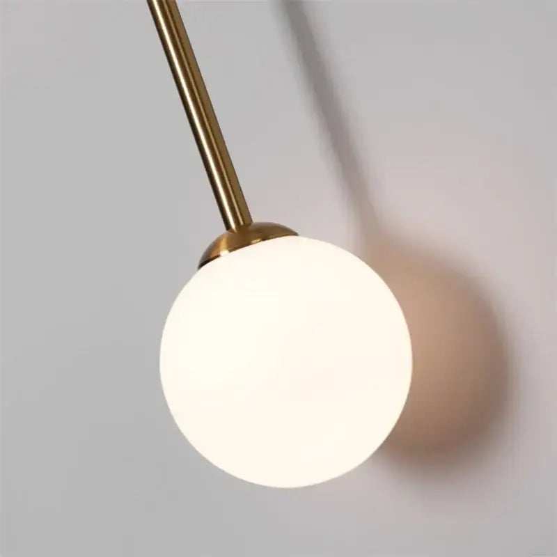 Modern black & golden led glass ball wall sconce for bedroom