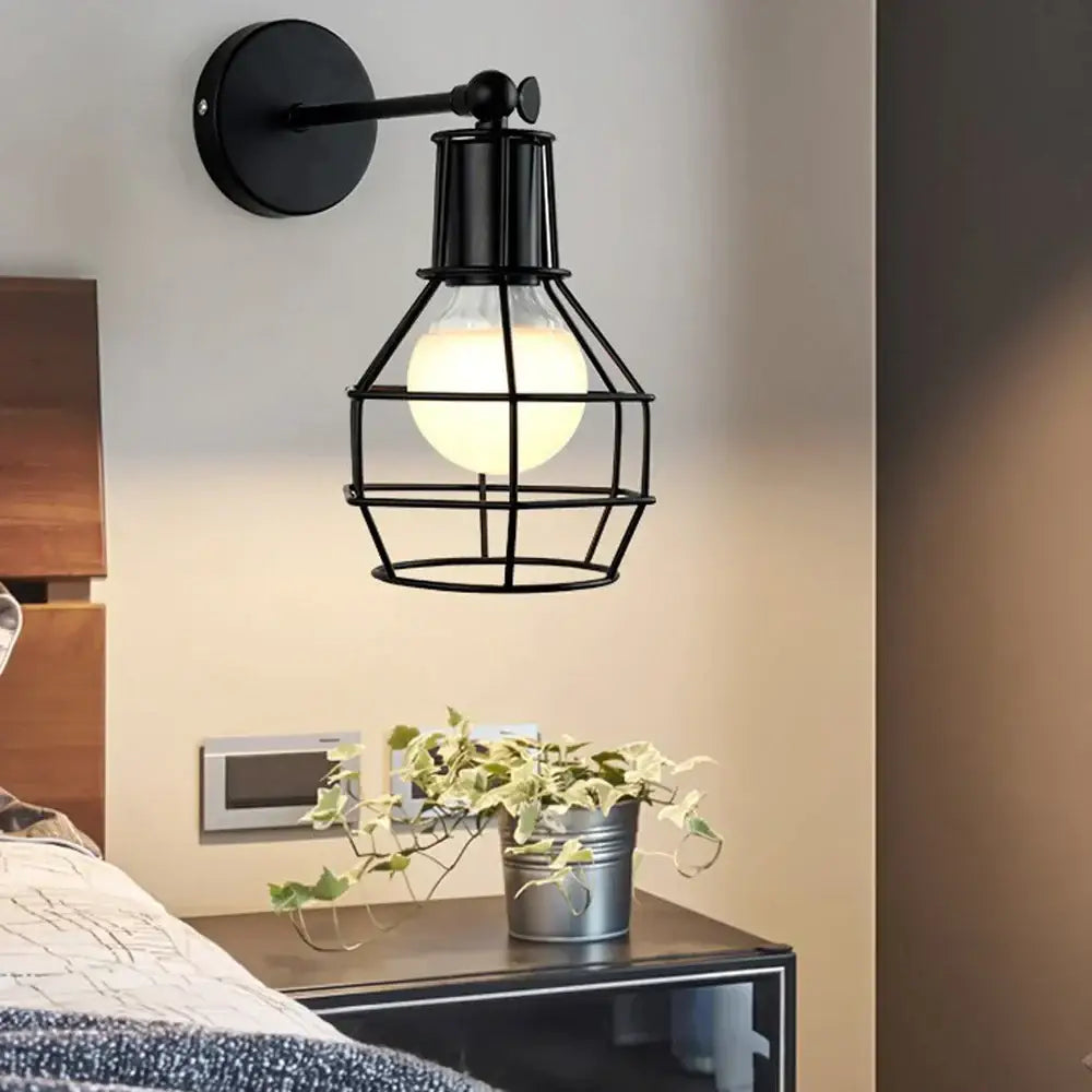 Retro black iron cage wall lamp for bedroom with amber bulb