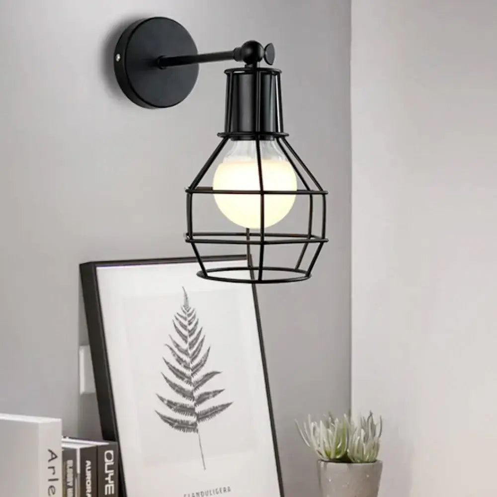 Retro black iron cage wall lamp for bedroom with amber bulb