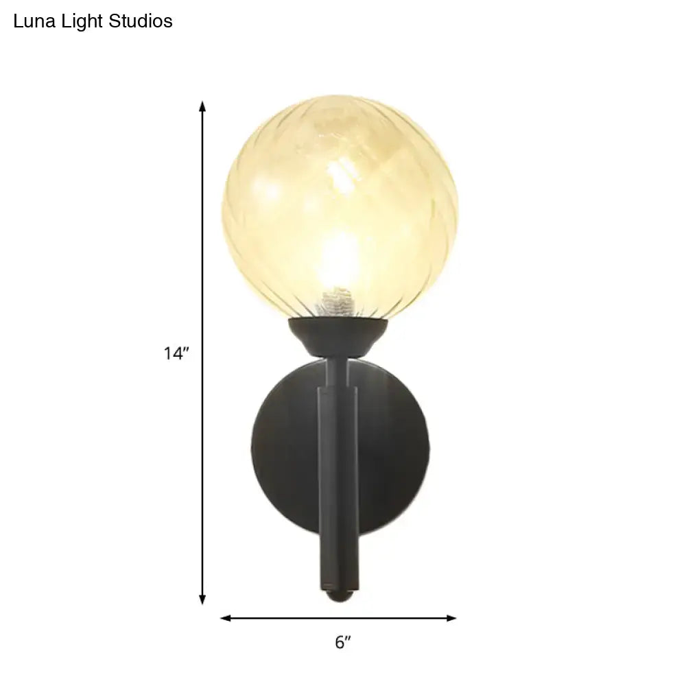 Modern black wall sconce with clear textured glass – bedroom light