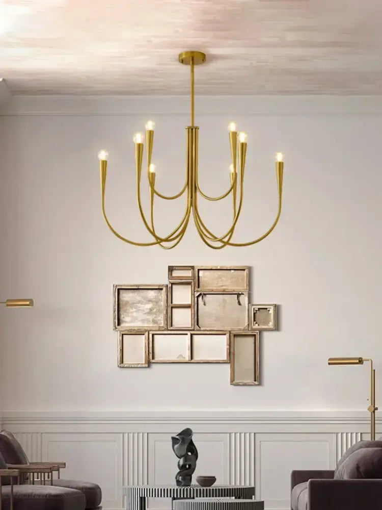 Decorbites brass chandelier for dining room with curved arms