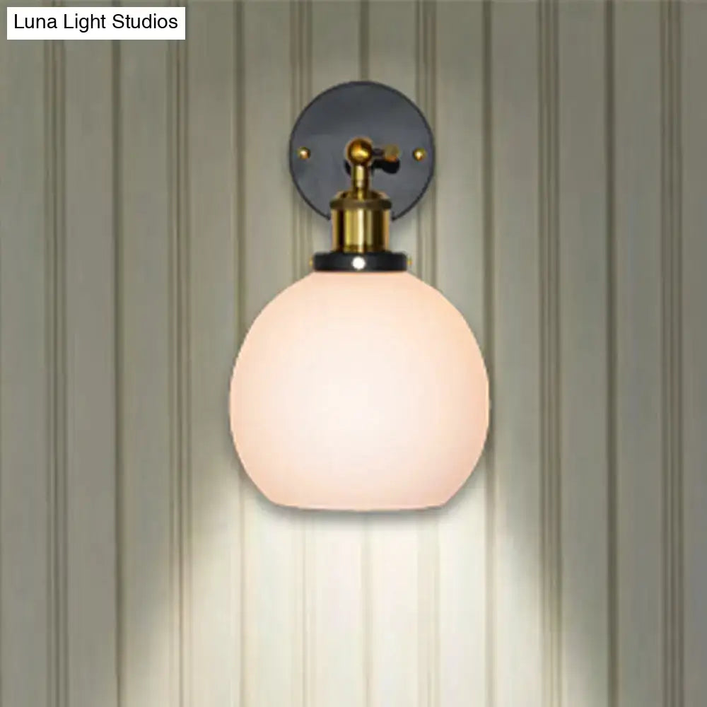 Industrial brass wall sconce with bubble white glass for bedroom