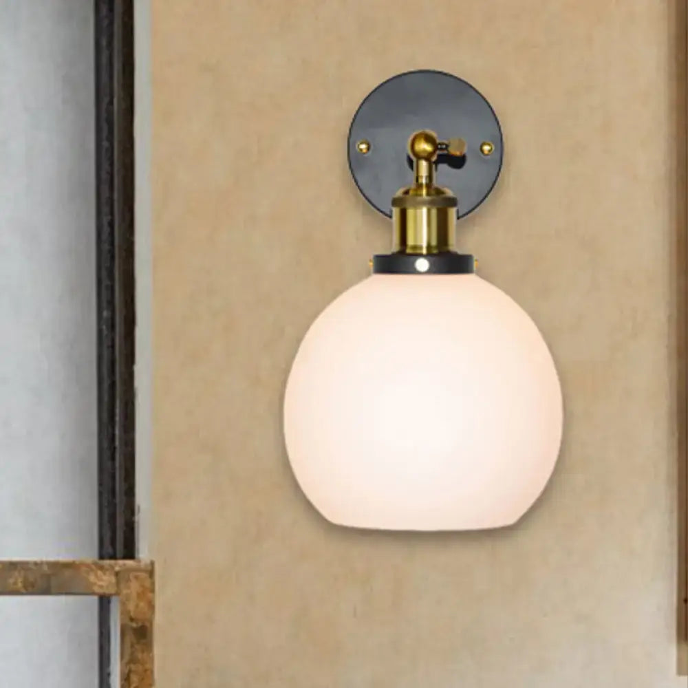 Industrial brass wall sconce with bubble white glass for bedroom
