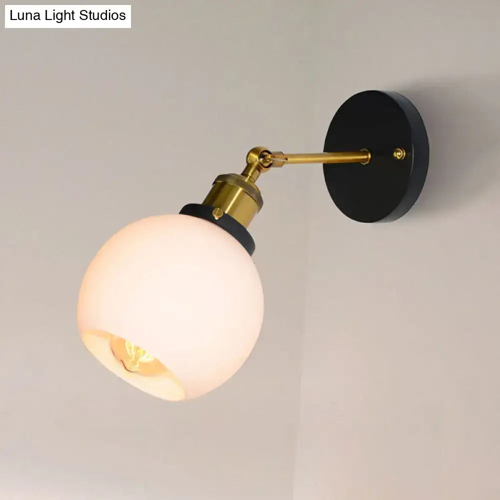 Industrial brass wall sconce with bubble white glass for bedroom