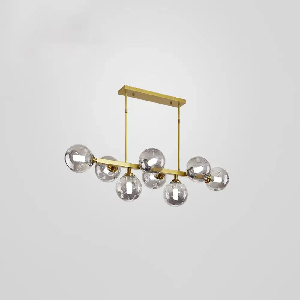 Modern black and brass globe shade pendant light for dining room