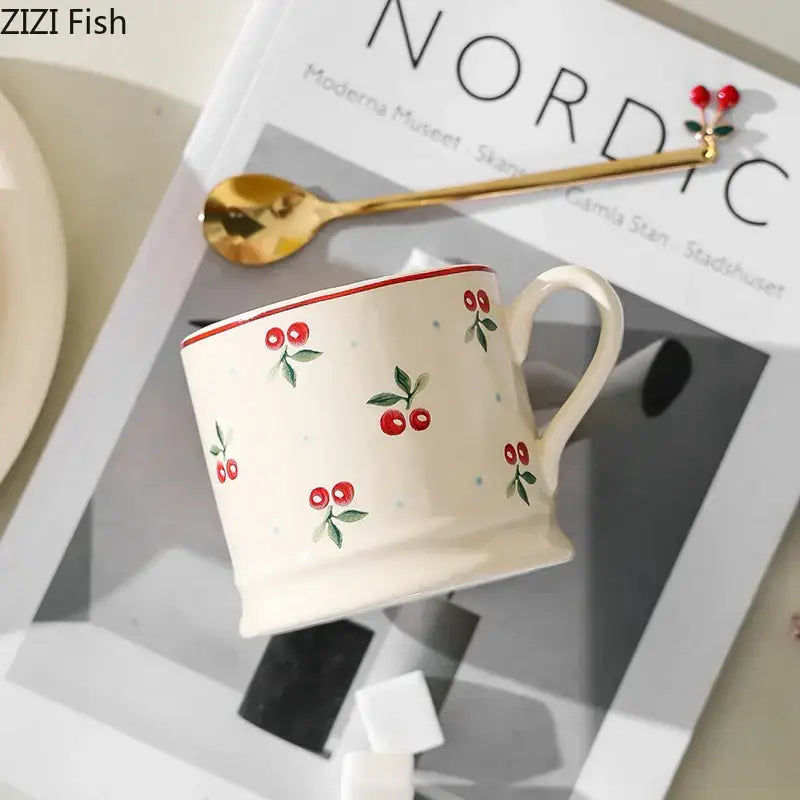 Cream cherry porcelain coffee mug with gold spoon – dining room tableware