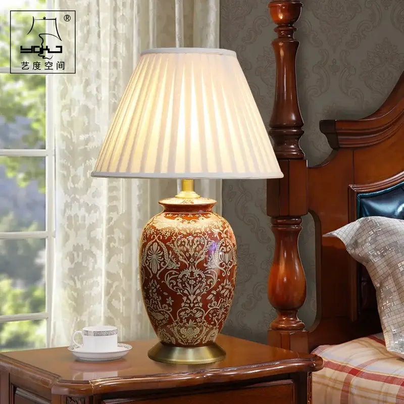 Vintage red ceramic table lamp for bedroom with ornate pattern