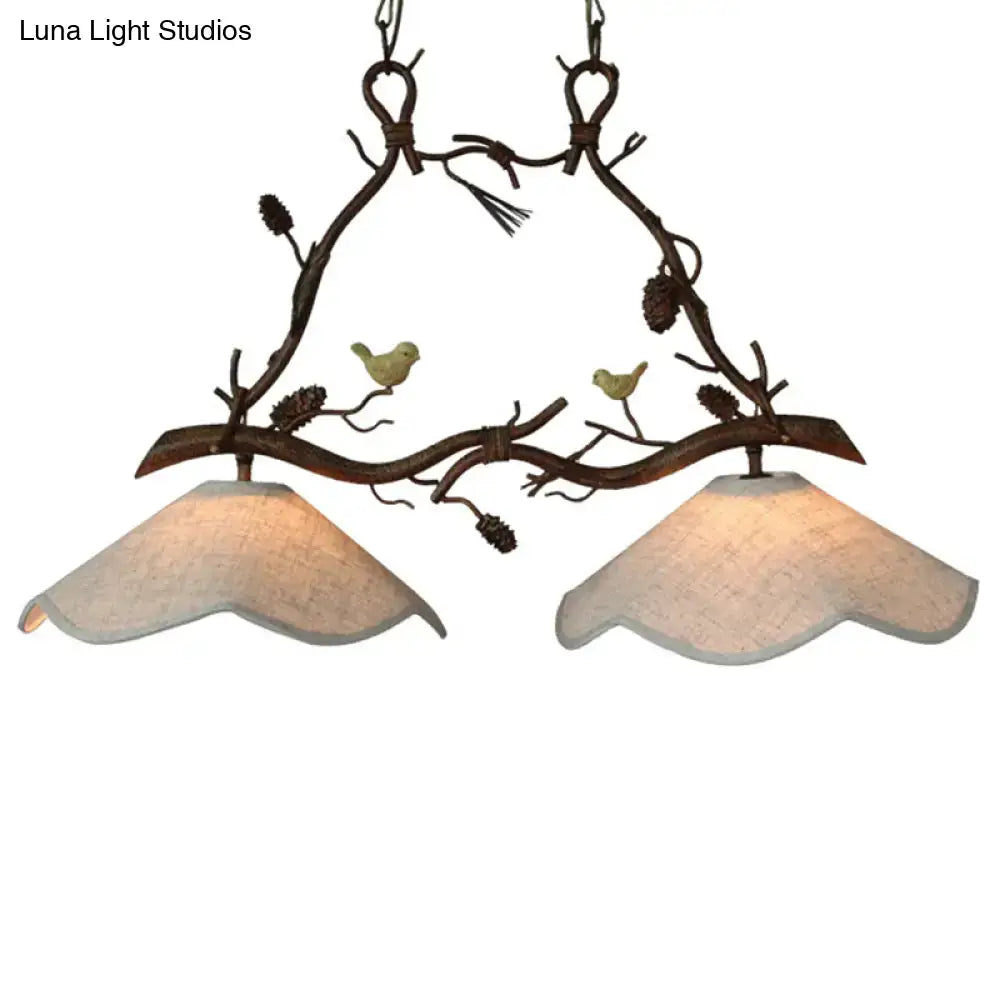 Rustic bronze branch suspension light dining room with bird accents